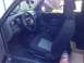 2010 Ford Ranger - The interior of a 2004 Ford Ranger pickup truck is visible, the dashboard, steering wheel, and seats.