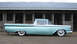 1959 Ford Ranchero - Side view of a two-tone 1959 Ford Ranchero, a distinctive body style and whitewall tires.