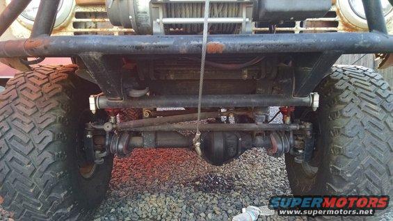 Front axle, suspension, and winch assembly of a modified off-road vehicle