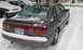 1996 Subaru Legacy - 1996 Subaru Legacy sedan covered in snow, parked next to another vehicle.