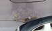 1996 Subaru Legacy - The wheel well of a vehicle shows significant rust and cracking, indicating poor condition.