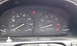 1996 Subaru Legacy - Interior view of a car's dashboard, showing the speedometer and tachometer with an odometer reading of 221423.