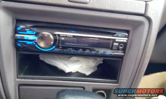 Sony car stereo with blue illuminated buttons and a silver knob