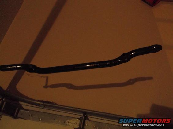 Black sway bar with bends and mounting points