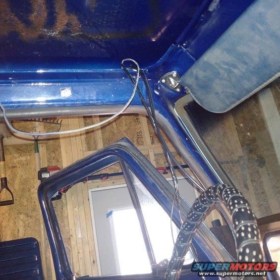 Blue interior with a black and white polka dot steering wheel