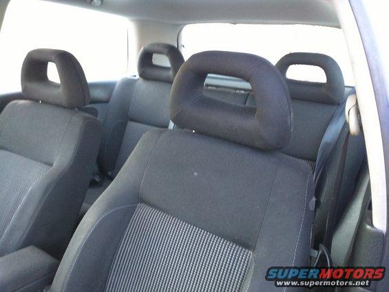 Interior rear seats with headrests and seatbelts