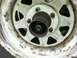 1981 Ford Bronco - This image shows a close-up of a wheel hub with a manual locking mechanism, not a 1981 Ford Bronco.