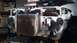 1993 Mercury Tracer - Car's front end disassembled, revealing the radiator and engine bay with a turbocharger installed.