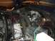 1979 Ford Bronco - Close-up view of an engine bay, showing various mechanical parts and wiring.
