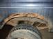 1979 Ford Bronco - Significant rust damage is visible around the wheel arch and on the vehicle's frame.
