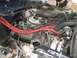 1979 Ford Bronco - Close-up view of a vehicle's engine compartment, showing complex mechanical components and wiring.