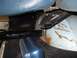 1979 Ford Bronco - The interior floor of the vehicle shows signs of rust and wear around the seat mounting hardware.