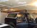 1979 Ford Bronco - This 1979 Ford Bronco is parked inside a garage with its doors open.