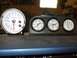 1979 Ford Bronco - Dashboard features a tachometer and three auxiliary gauges for monitoring engine vitals.