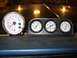 1979 Ford Bronco - Dashboard gauges including a tachometer, oil pressure, water temp, and voltage meters are visible.