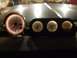 1979 Ford Bronco - Close-up of illuminated vehicle gauges, including a tachometer and other readouts.