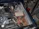 1979 Ford Bronco - The engine bay of a 1979 Ford Bronco shows its internal components and wiring.