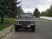 1979 Ford Bronco - Front view of a 1979 Ford Bronco parked on a residential street, equipped with a winch and custom bumper.