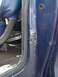 1979 Ford Bronco - Door frame shows significant rust damage and dents.