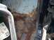 1979 Ford Bronco - Significant rust damage is visible on the interior floor pan of the vehicle.