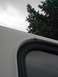 1979 Ford Bronco - Detail shot of a vehicle's body and window seal, with a Supermotors.net watermark.