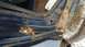 1979 Ford Bronco - Severe rust damage is visible on the door frame and rocker panel of this vehicle.