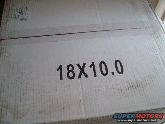 Cardboard box with "18X10.0" printed on it