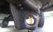 1994 Ford Bronco - This image shows a close-up view of a heavily rusted suspension component from the undercarriage of a vehicle.