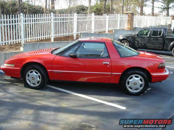 Red coupe side view