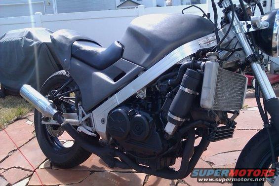 Side view of a 1986 Honda Interceptor motorcycle with its engine exposed