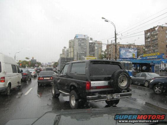 Black 1987 Ford Bronco rear view with spare tire