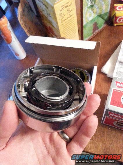 Chrome Warn Hub assembly with internal components held in hand