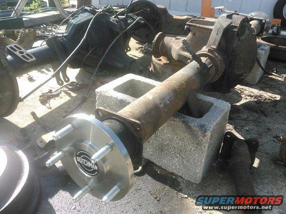 got the shafts in and axle all buttoned up ready for gearoil. 

just as I thought, once assembled, the c-clip being alittle loose is no issue at all. there is virtually no play in the axle

im having issues finding a correct rotor to use. the hub pilot on the new axles are 3.440 inches to match the same as the 8.8 inch hub pilot. however the rotors I want to use are 3.88 inches so they will not be hubcentric or lug centric meaning I have no way to make them stay centered.