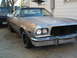 1973 Ford Ranchero - This 1973 Ford Ranchero is shown in a 3q-front view, appearing to be in a state of restoration with its unpainted body and black vinyl roof.
