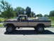1979 Ford F-150 - This two-tone Ford F-150 pickup truck is shown from the side on a sunny day.