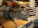 1978 Ford Bronco - Close-up view of a vehicle's suspension system, showing a shock absorber and coil spring.