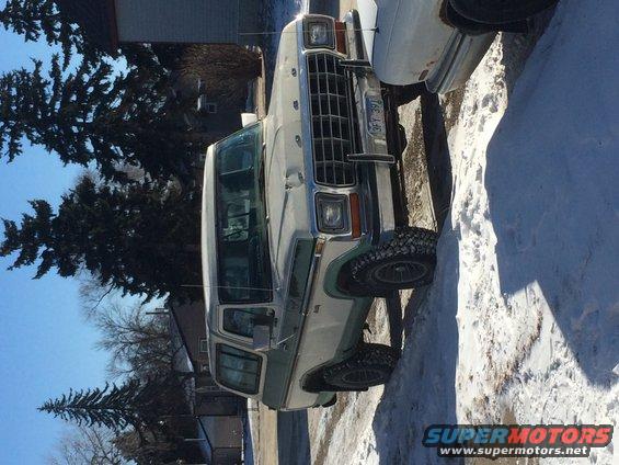 1978 Ford Bronco parked in snow, front 3/4 view