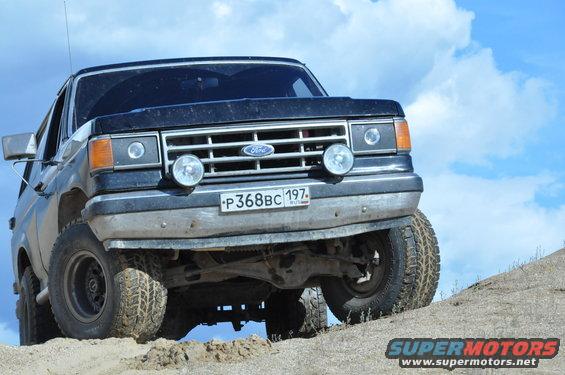 Ford Bronco on a sandy incline, front view. License plate P368BC 197