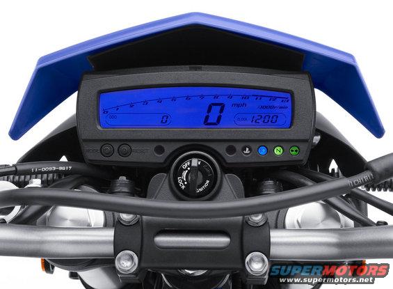 Motorcycle digital dashboard with blue screen showing speed, odometer, and clock