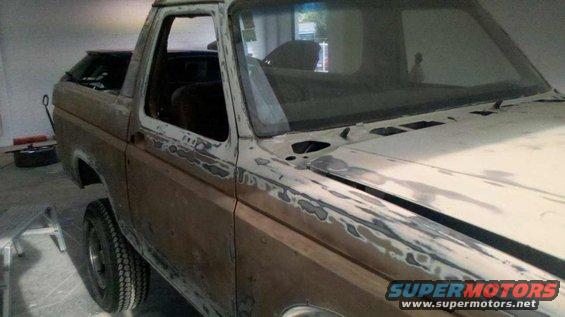 1982 Ford Bronco with body filler on the fender and door