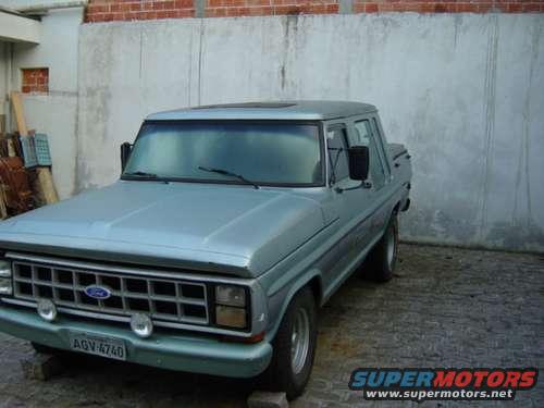 1973 Ford F-Series truck, light blue, parked outdoors