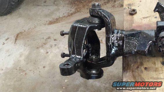 Black painted vehicle suspension knuckle and ball joint assembly