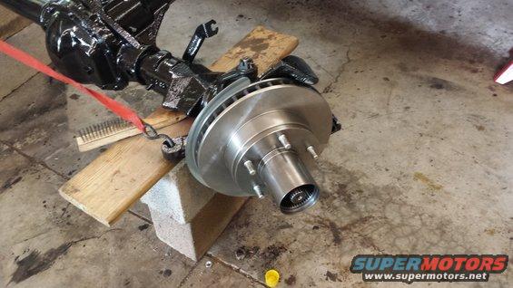 Front axle assembly with brake rotor and hub