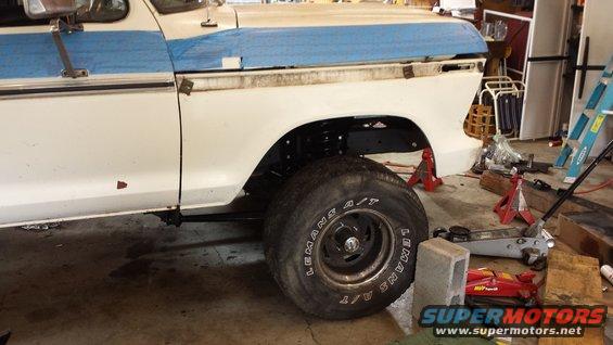 1978 Ford F-150 truck side view, undergoing repairs with front fender removed
