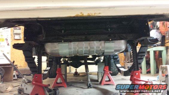 1978 Ford Bronco undercarriage with fuel tank and leaf springs visible