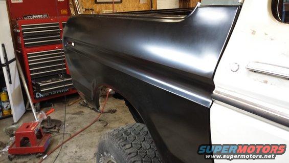 1978 Ford Bronco rear quarter panel, unpainted, with white door