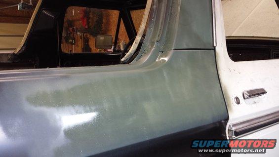 1978 Ford Bronco side panel with primer and door handle