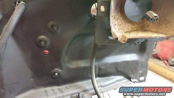 1978 Ford Bronco engine bay interior with visible wiring and mounting points