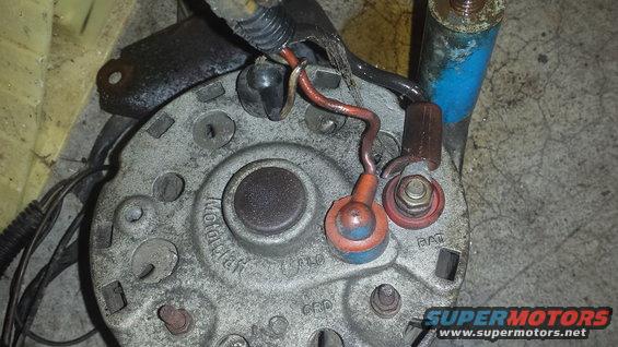 Motorcraft alternator with BAT and GRD labels visible