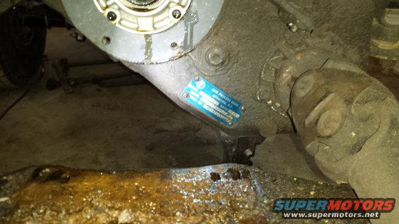 Drivetrain component with blue data plate showing manufacturing information